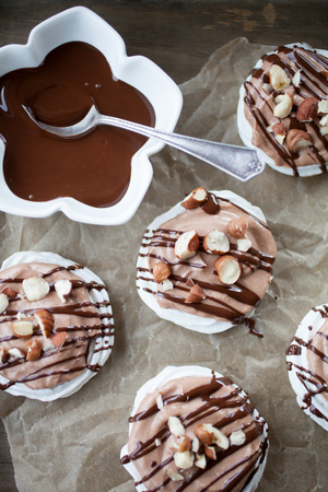 Mini pavlova with hazelnut cream and chocolateの写真素材