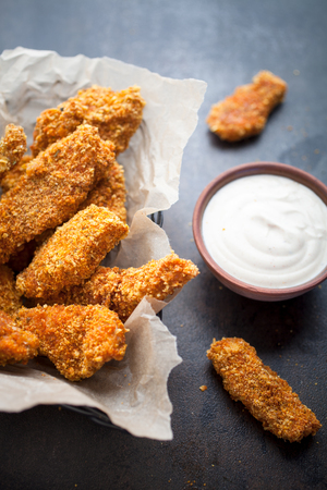 Homemade chicken fingers and dip sauceの写真素材