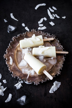 Popsicles made from pineapple and coconutの写真素材