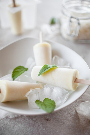 Popsicles made from pineapple and coconutの写真素材