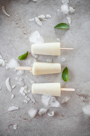 Popsicles made from pineapple and coconutの写真素材
