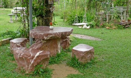 Garden table and four chairs, made from stoneの写真素材