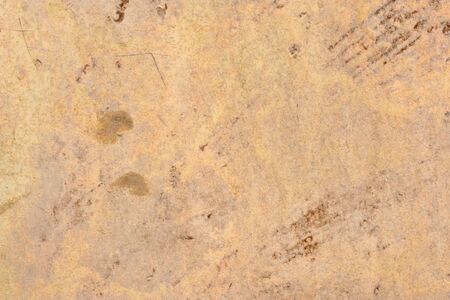 Fiery rusty, old metal as a backgroundの写真素材