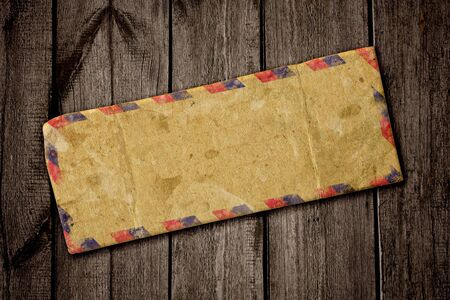 Vintage old airmail envelope on a dark backgroundの写真素材