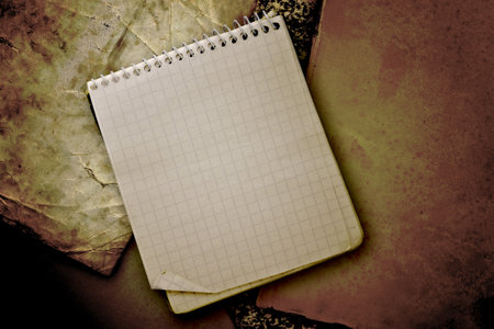 old used notebook on vintage backgroundの写真素材