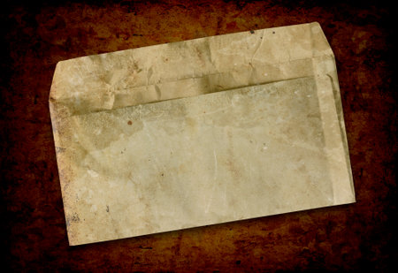 Vintage envelope on grunge background with space for text or imageの写真素材