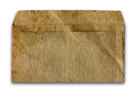 Vintage grungy old envelope. Dirt, folds and creases, Isolated on white.の写真素材