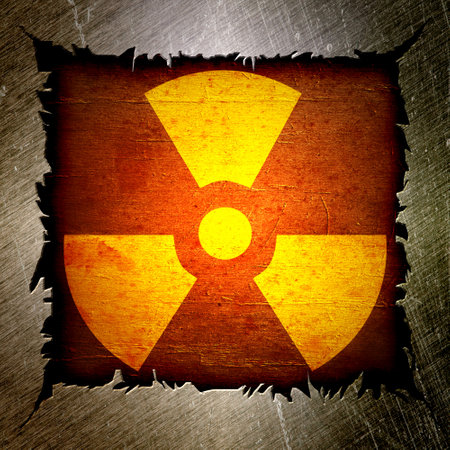 old metal background with some soft highlights and folds on it and a sign of radiationの写真素材