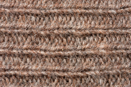 Brown wool yarn texture background. Close up of wool yarn texture.