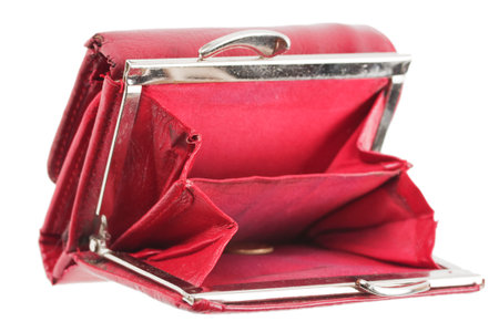 Old red purse against coin