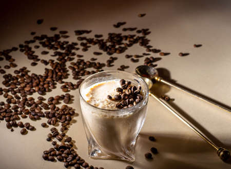 on a light background dessert coffee mousse and coffee grains