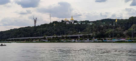 Panorama of Kiev with the Dnieper River, the statue of the Motherland and the Kiev Lavra Monastery,...