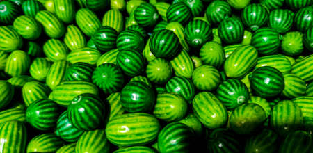 Colorful sweets background. Sugar candies and marmalade. assortment of sweets. Watermelon-shaped candy, watermelon-like marmalade.の写真素材