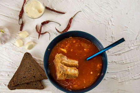 Ukrainian borsch. Traditional dish of Ukraine. Red borscht on a white plate.の写真素材