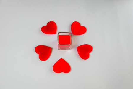 White background with red skrdechki, candles. Valentine's Day concept. Valentine's Day banner. Valentine's day background.の写真素材