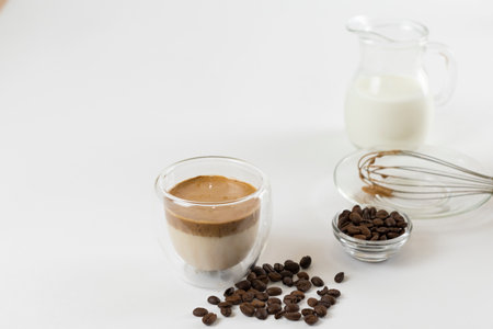 Cold dalgona coffee. Whipped instant coffee. Popular coffee. Latte espresso with coffee foam in a glass.の写真素材