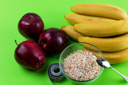 Protein food. Breakfast ingredients. Fresh fruit and oatmeal. Vegetarian diet.の写真素材