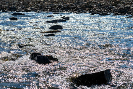 Mountain river in the mountains of Ukraine. Peremiyskaya river, Ivano-Frankivsk region. Spring 2022.の写真素材