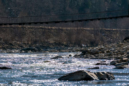 Mountain river in the mountains of Ukraine. Peremiyskaya river, Ivano-Frankivsk region. Spring 2022.の写真素材