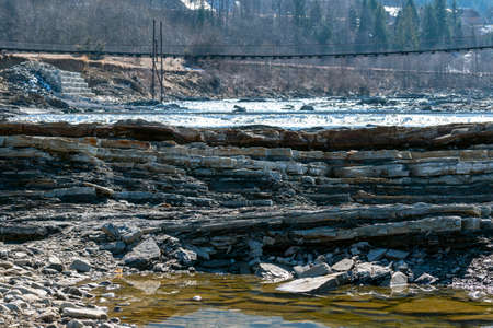 Mountain river in the mountains of Ukraine. Peremiyskaya river, Ivano-Frankivsk region. Spring 2022.の写真素材