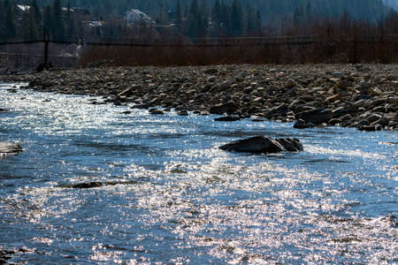 Mountain river in the mountains of Ukraine. Peremiyskaya river, Ivano-Frankivsk region. Spring 2022.の写真素材