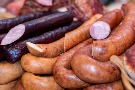 Assortment of sausages for sale on a market stall.の写真素材