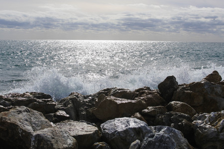 Waves crashing on the rocksの写真素材