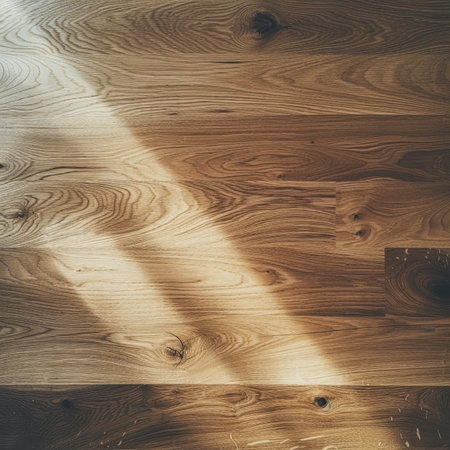 Light and shadow on wooden floor texture backgroundの素材