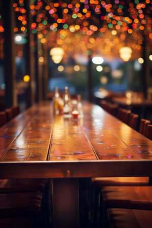 An Empty Restaurant with a Long Wooden Tableの素材