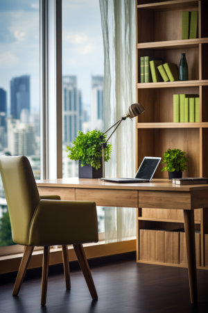 A desk with a laptop, books, and plants in front of a large window with a view of the cityの素材