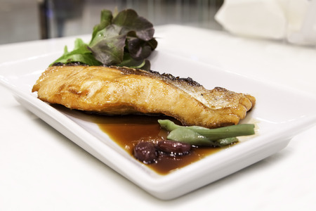 Grilled salmon with teriyaki sauce on the table