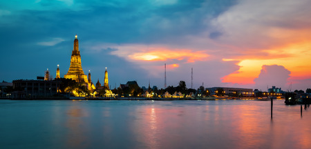 Panorama of the beautiful temple along the Chao Phraya river at twilight  (Phra Prang Wat Arun in Bangkok)の写真素材