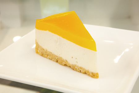 Mango Cheescake on the tableの写真素材
