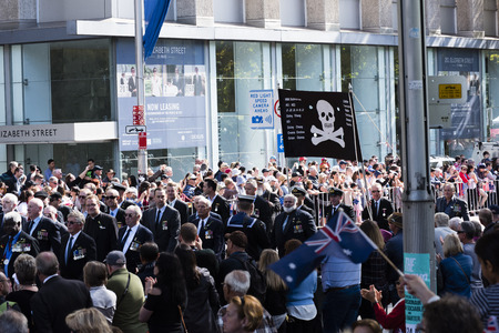 Submariners march down Elizabeth St carrying the skull and crossbones bannerのeditorial素材