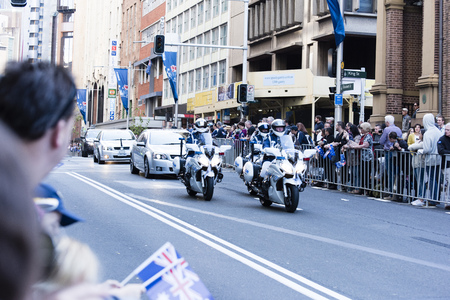Police motorcycle escorts the Lt. Governor of NSW along Elizabeth Street at the head of the processionのeditorial素材