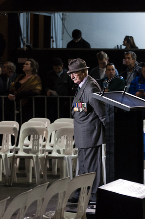 MC Lt Col. John Moore in deep thought prior to the commencement of the ANZAC dawn serviceのeditorial素材