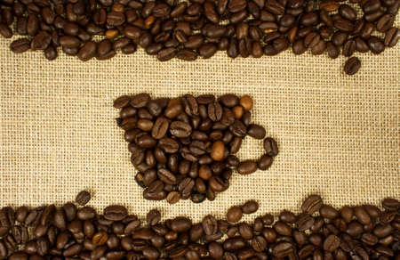cup of coffee on burlapの写真素材
