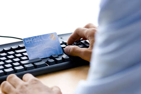 man is shopping and paying onlineの写真素材
