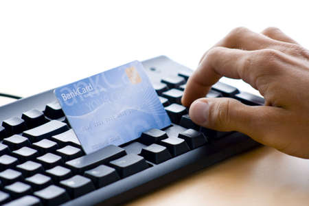 man is shopping and paying onlineの写真素材
