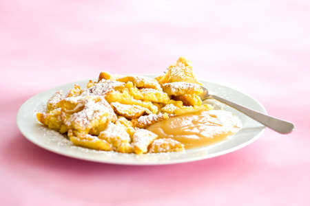 Austrian sweet dessert called kaiserschmarrn with apple sauceの写真素材