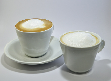 Two cups of coffee with milkの写真素材