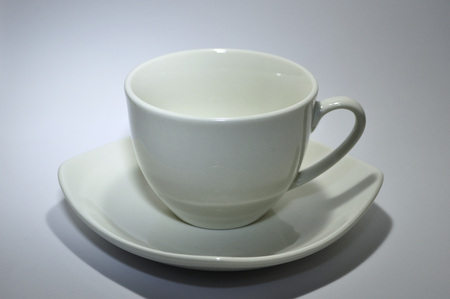 White porcelain coffee cup isolated on white backgroundの写真素材