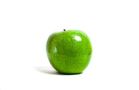Juicy green apple isolated on white backgroundの写真素材