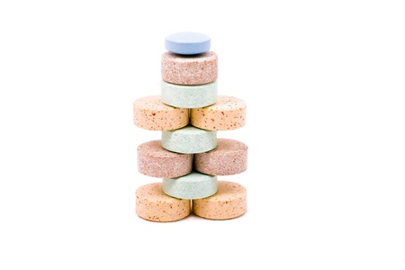 a pyramid of vitamins isolated over white background