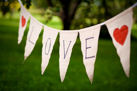 tension cable with the word love and red heartsの写真素材