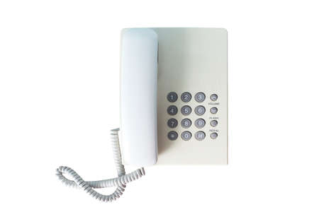 White landline telephone isolated on white background