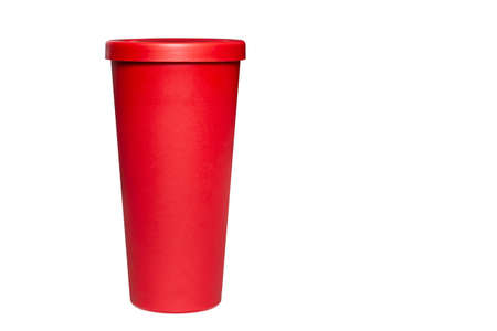 Red plastic cup isolated on a white background with clipping path. Glass for cold coffee.の写真素材