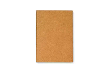 Top view of brown notebook. Blank book isolated on white background with  .の写真素材