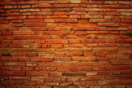 Old red brick wall texture for background.