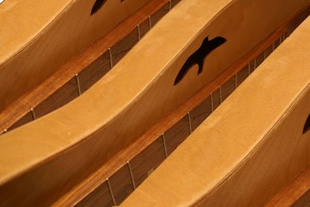 Row of Dulcimers made of two tone woodの写真素材